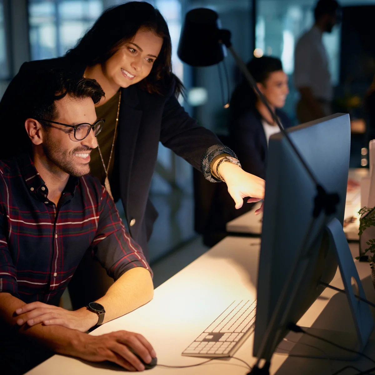 IT professionals collaborating on technology solutions